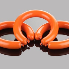 Orange casings for curved sausages