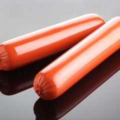 Orange casings for cooked round sausages